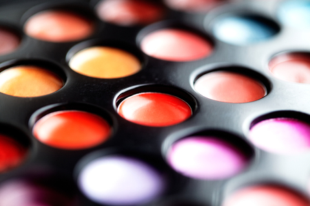 Close-up macro shot of lipgloss palette. Colourful salon cosmetics for makeup artist. Vibrant make-up product. Soft focusの写真素材