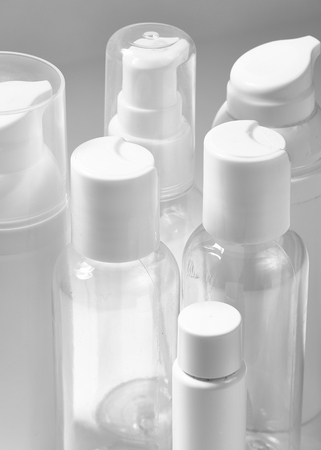 White cosmetic bottles on white background. Wellness, spa and body care bottles collection. Beauty treatment, bathroom setの写真素材