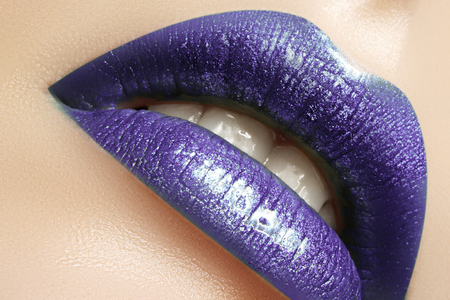 Glamour Gloss Lip Make-up. Fashion Makeup Beauty Shot. Close-up Sexy full Lips with celebrate purple glossy lipstickの写真素材