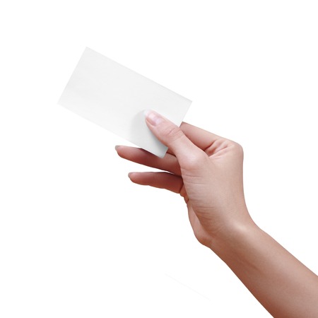 Beautiful female Hand holding paper business card on white background. Gift card, cutaway, graphic design.の写真素材