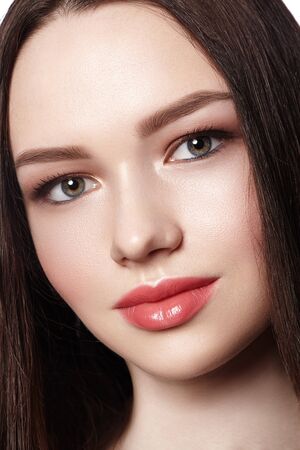 Close-up of Beautiful Bride. Weddind or Celebrate Make-up. Woman with Clean Shiny Skin, Natural Lip Gloss on Lips. Fresh Styleの写真素材