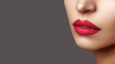 Beautiful Woman Lips with Fashion Lipstick Makeup. Cosmetic, Fashion Make-Up Concept. Beauty Lip Visage. Passionate kiss. Female Sexy Open Mouthの写真素材