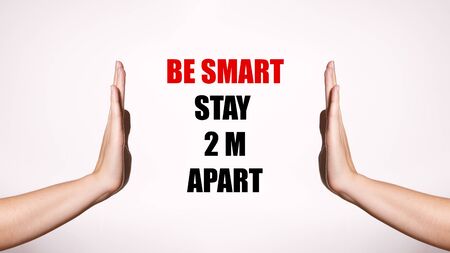 Be Smart, Stay 2m Apart. Distancing and Contact-less Greetings. Healthcare Poster with Red Inscription. Two Hands Gesture Limit Social Distance. Public Health Conceptの写真素材