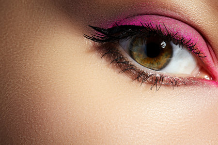 Closeup Macro of Woman Face with Blue Eyes Make-upの写真素材