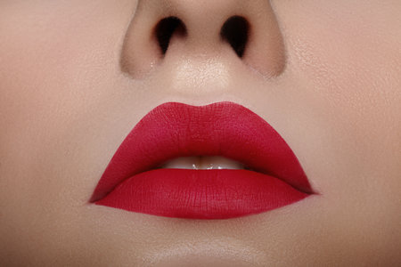 Beautiful Woman Lips with Fashion Red Lipstick Makeup. Cosmetic, Fashion Make-Up. Beauty Lip Visage. Passionate kissの写真素材