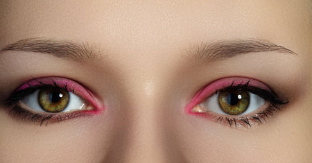 Closeup Macro of Woman Face with Pink Eyes Make-up. Fashion Celebrate Makeup, Glow Clean Skinの写真素材