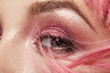Closeup Macro of Pink Fashion Eye Make-up. Expressive Makeup, Bright Summer Eyeshadows and Magenta...