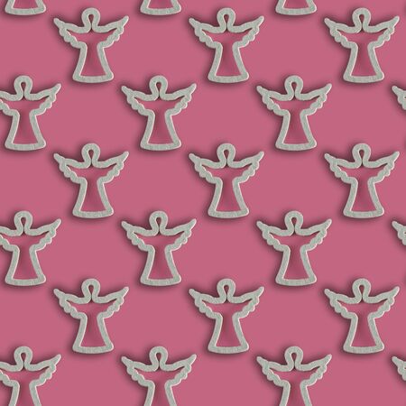 Seamless pattern of Christmas figurines of angels on a pink background. New Year. Xmas composition. Flat lay.の写真素材