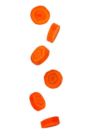 Falling green hot peppers isolated on color background with clipping path. Flying vegetables.の写真素材