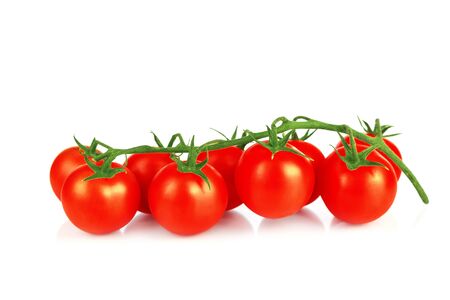 Fresh ripe red cherry tomatoes isolated on a white background. Close up.の写真素材