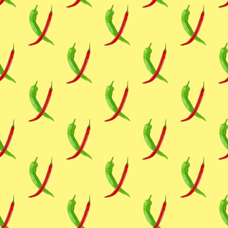 Seamless pattern of green and red chilis on a yellow. Food background, texture. Minimal concept.の写真素材