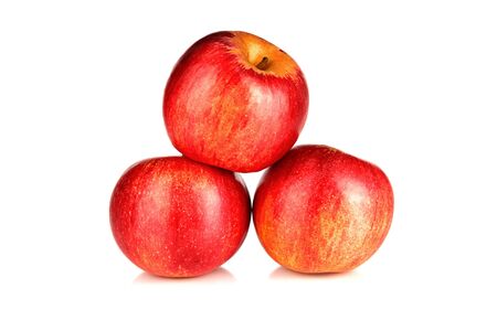 Three  red apples on a white background   .の写真素材