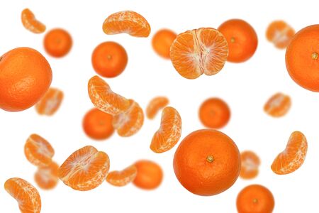 Falling tangerines isolated on a white background as package design element and advertising. Flying food. Floating fruits in the air. Top viewの写真素材
