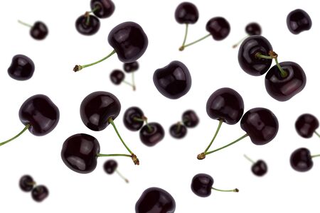 A falling ripe cherry isolated on a white background  as package design element and advertising. Flying food. Levitation. Top view.の写真素材