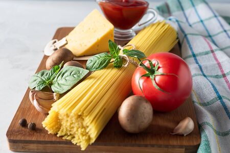 Spaghetti and ingredients for making pasta. Italian food concept.の写真素材