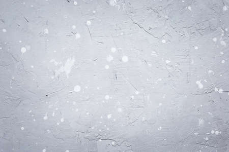 Textured putty on the wall. Rough background of a grunge wall. Space for text.の写真素材