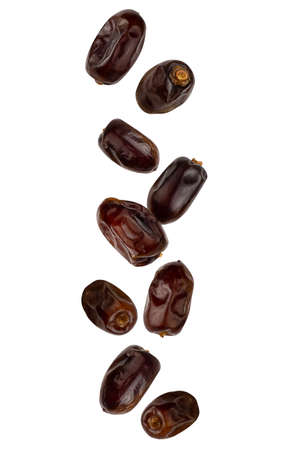 Falling delicious dates are isolated on a white background   as package design element and advertisingの写真素材