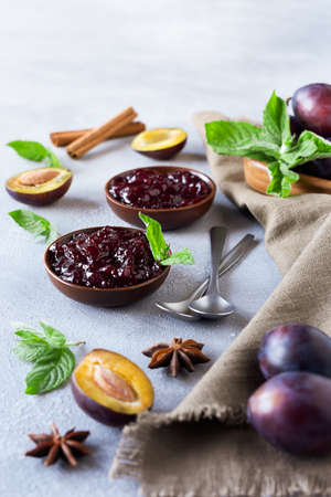 Plum jam and ingredients for its preparation. Homemade marmalade for a delicious Breakfast.の写真素材