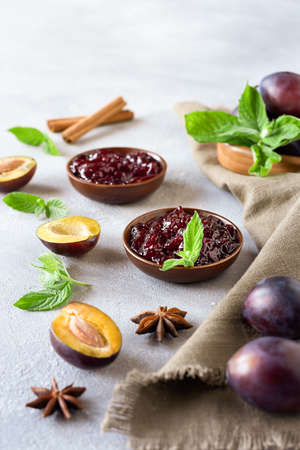 Plum jam and ingredients for its preparation. Homemade marmalade for a delicious Breakfast.の写真素材