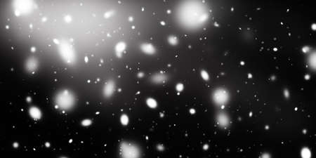 Falling snow on a dark night background. Winter texture, patternの写真素材