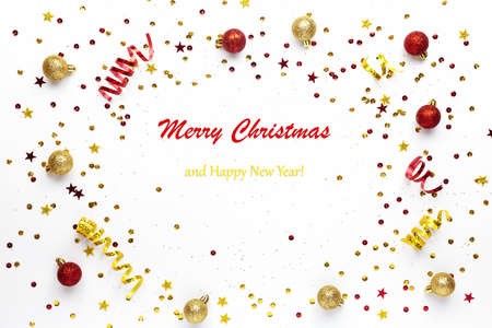 Festive Christmas Golden and red decorations on a white background. Festive new year sparkling texture.の写真素材