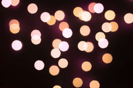 Bokeh background. Colored bright blurred texture of lights.の写真素材