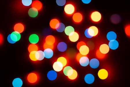 Background of colored bokeh. Multi-colored bright blurred texture of lightsの写真素材