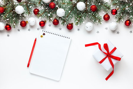 Wishlist, checklist, to do list activity for New Year. Gift and decorations. Xmas card. Christmas invitation. View from above. Flat layの写真素材