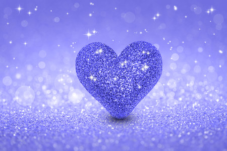 Love sparkling Valentines day background with violet heart. Holiday greeting card. Very peri, color of the year 2022.の写真素材
