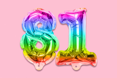 Rainbow foil balloon number, digit eighty one on a pink background. Birthday greeting card with...
