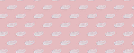 Seamless pattern. White cream textures on a pink background. Smears of cosmetic skin care products. Wellness and beauty concept. Banner.の写真素材