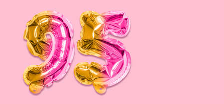 Rainbow foil balloon number, digit ninety five on a pink background. Birthday greeting card with inscription 95. Anniversary concept. Numerical digit. Celebration event template. Banner.の写真素材