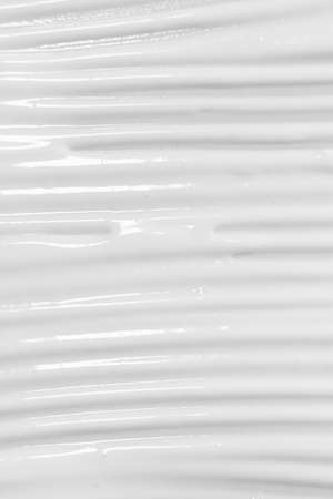 The texture of the white cream. cosmetic background. cosmetic product for body care. wellness and beauty concept.の写真素材