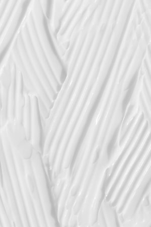 The texture of the white cream. cosmetic background. cosmetic product for body care. wellness and beauty concept.の写真素材