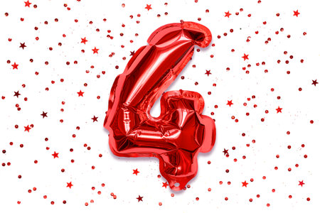 The number of the balloon made of red foil, the number four on a white background with sequins. Birthday greeting card with inscription 4. Numerical digit, Celebration event, template.の写真素材