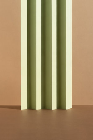 Abstract beige and green background for the presentation of a cosmetic product. Empty scene with a geometric backdrop. Podium for product promotion, beauty, natural eco cosmetic.の写真素材