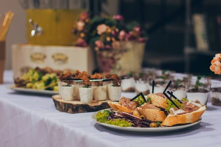 Catering table set service at restaurant before party.の写真素材