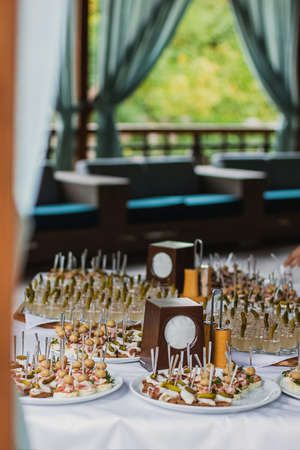 Catering table set service at restaurant before party.の写真素材