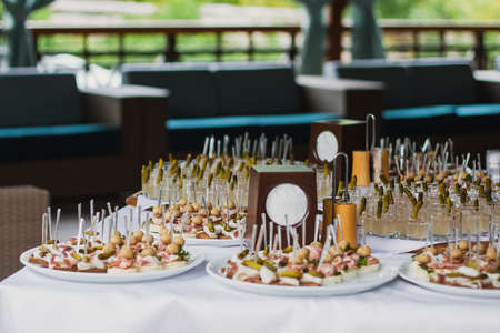 Catering table set service at restaurant before party.の写真素材