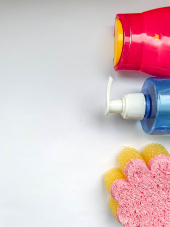 baby bath kit. A flower-shaped washcloth, rubber toys, foam and shampoo for bathing a child on a...