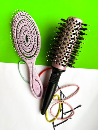 Combs, elastic bands and hair clips, hair dryer. A set for hairstyles, a set of hair stylist.