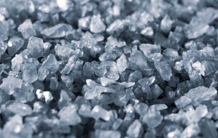 Background with violet crystals. The texture of the salt.の写真素材