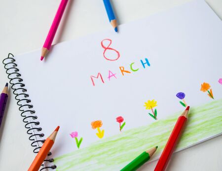 Pencil like a child`s hand drawn on March 8th. Holiday child painted March 8.