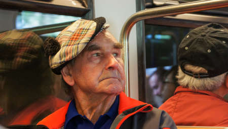 Gornergrat, Zermatt, Switherland - August 7, 2014: A Man on a Train, travel photo, a local residentのeditorial素材