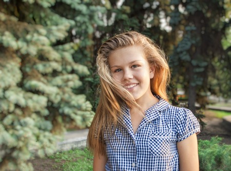 Happy beautiful teenage girls in nature,