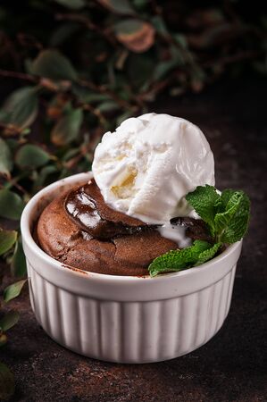 Chocolate fondant with a scoop of ice cream. Hot dessert. French dessert.の写真素材