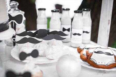 Candy bar at Birthday party. Style little gentleman. Black white colorの写真素材