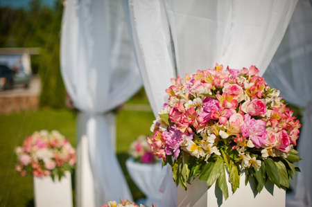 Wedding arch. The idea of decorating the wedding area with flowersの写真素材