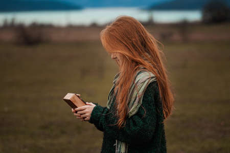 The girl plays the kalimba. Percussion instrument. Soft focusの写真素材
