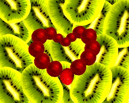 Strawberry heart on a kiwis background の写真素材